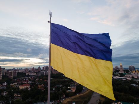 Kyiv - National flag of Ukraine by day. Aerial. Kiev