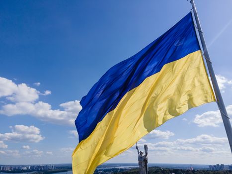 Kyiv - National flag of Ukraine by day. Aerial. Kiev