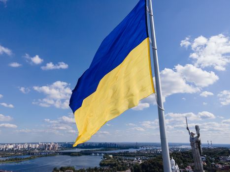 Kyiv - National flag of Ukraine by day. Aerial. Kiev