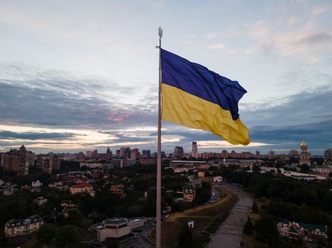 Kyiv - National flag of Ukraine by day. Aerial. Kiev