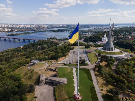 Kyiv - National flag of Ukraine by day. Aerial. Kiev