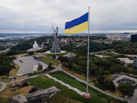 Kyiv - National flag of Ukraine by day. Aerial. Kiev