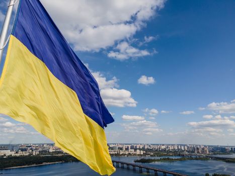 Kyiv - National flag of Ukraine by day. Aerial. Kiev