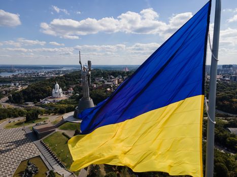 Kyiv - National flag of Ukraine by day. Aerial. Kiev