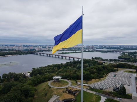 Kyiv - National flag of Ukraine by day. Aerial. Kiev