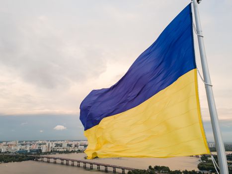 Kyiv - National flag of Ukraine by day. Aerial. Kiev