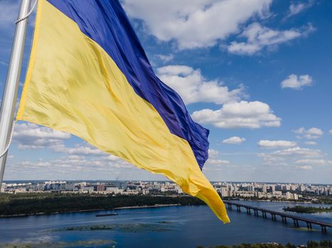 Kyiv - National flag of Ukraine by day. Aerial. Kiev