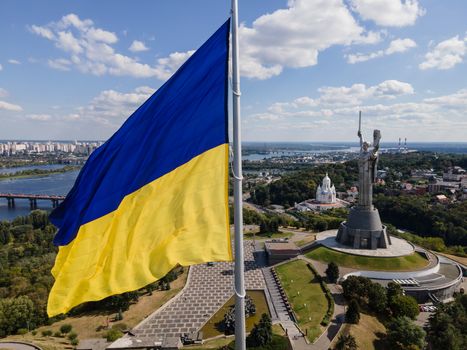 Kyiv - National flag of Ukraine by day. Aerial. Kiev