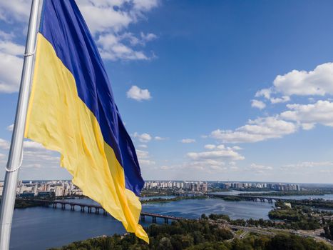 Kyiv - National flag of Ukraine by day. Aerial. Kiev