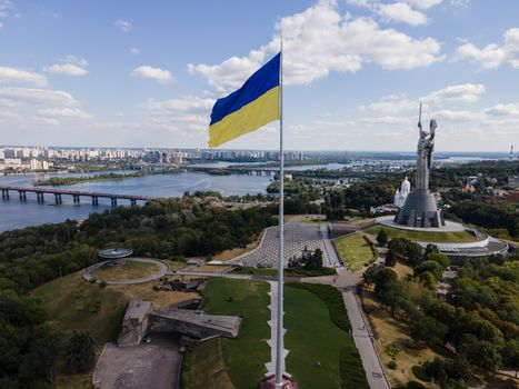 Kyiv - National flag of Ukraine by day. Aerial. Kiev