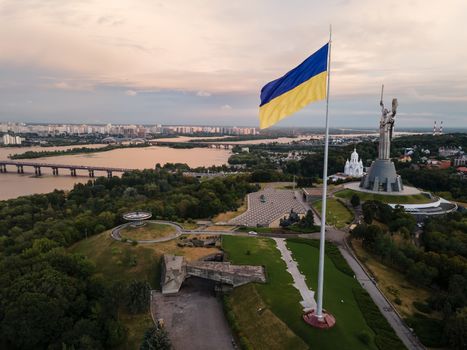 Kyiv - National flag of Ukraine by day. Aerial. Kiev