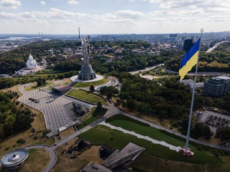 Kyiv - National flag of Ukraine by day. Aerial. Kiev