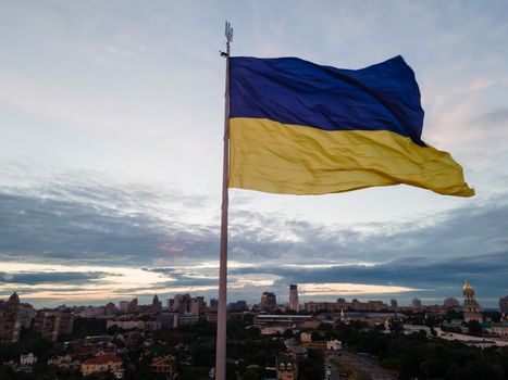 Kyiv - National flag of Ukraine by day. Aerial. Kiev