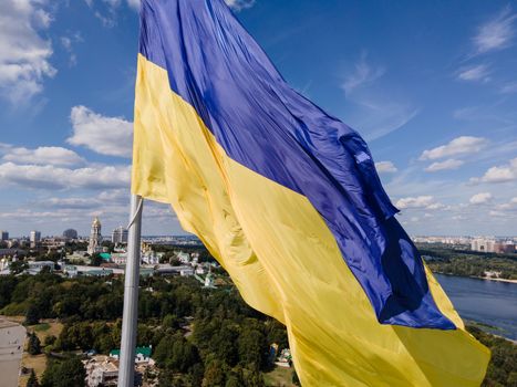 Kyiv - National flag of Ukraine by day. Aerial. Kiev