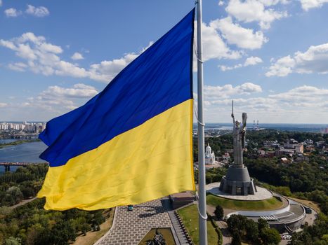 Kyiv - National flag of Ukraine by day. Aerial. Kiev