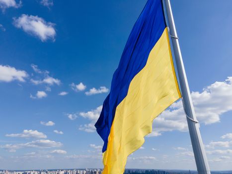 Kyiv - National flag of Ukraine by day. Aerial. Kiev