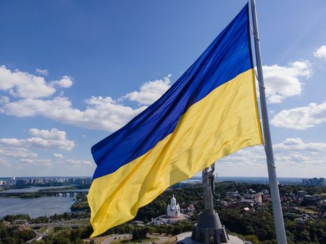 Kyiv - National flag of Ukraine by day. Aerial. Kiev