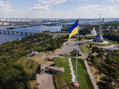 Kyiv - National flag of Ukraine by day. Aerial. Kiev