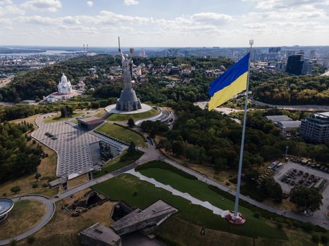 Kyiv - National flag of Ukraine by day. Aerial. Kiev