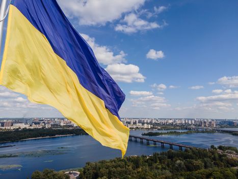 Kyiv - National flag of Ukraine by day. Aerial. Kiev