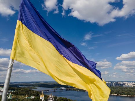 Kyiv - National flag of Ukraine by day. Aerial. Kiev