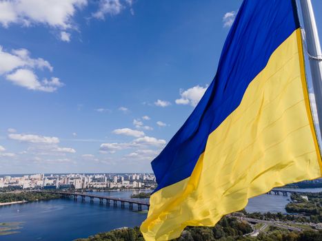 Kyiv - National flag of Ukraine by day. Aerial. Kiev