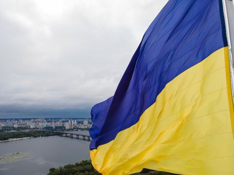 Kyiv - National flag of Ukraine by day. Aerial. Kiev