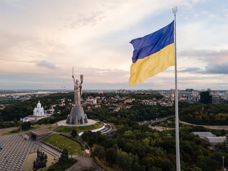 Kyiv - National flag of Ukraine by day. Aerial. Kiev