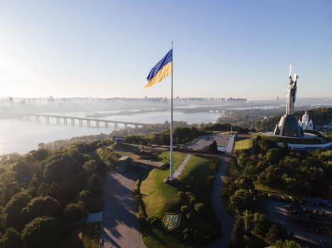 Kyiv - National flag of Ukraine by day. Aerial. Kiev