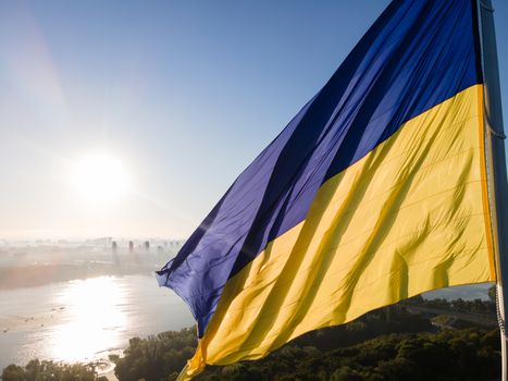 Kyiv - National flag of Ukraine by day. Aerial. Kiev