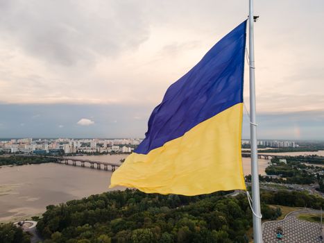 Kyiv - National flag of Ukraine by day. Aerial. Kiev