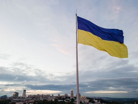 Kyiv - National flag of Ukraine by day. Aerial. Kiev