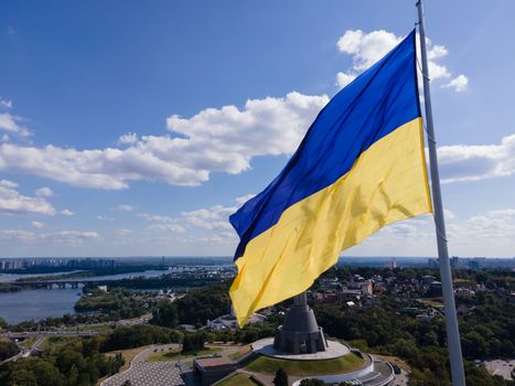 Kyiv - National flag of Ukraine by day. Aerial. Kiev