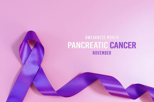 Pancreatic Cancer Awareness Ribbon, purple ribbons on light pink background