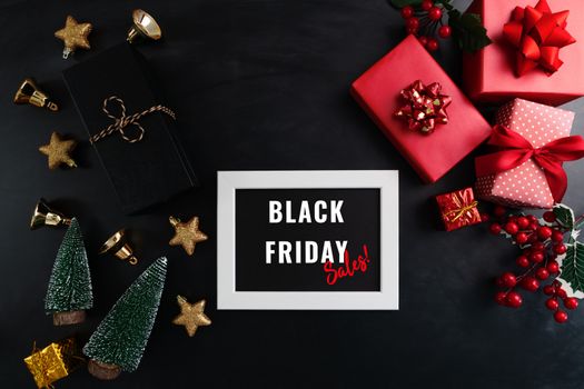 gift box with photo frame for Black Friday Sale concept on black background