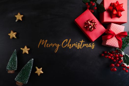 Merry Christmas, xmas present gift and decoration on black background