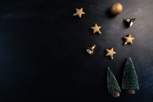 Christmas present with xmas decoration on black background