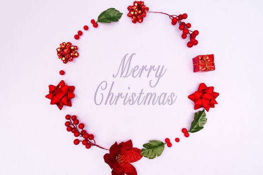 Christmas wreath on purple background. Christmas decoration. Flat lay, top view, copy space