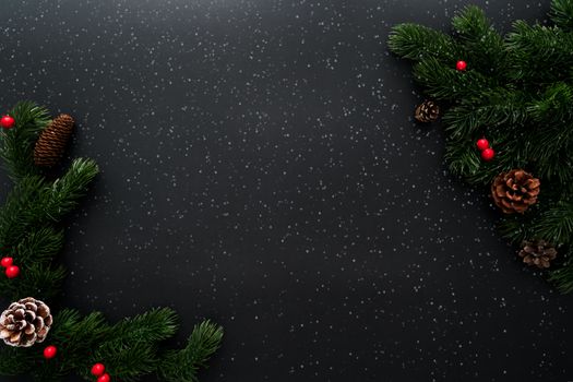 Christmas pine tree with xmas decoration on black background