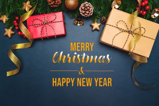 Christmas present and pine tree with xmas decoration on blue background