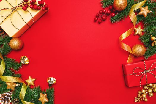 Christmas present and pine tree with xmas decoration on Red background