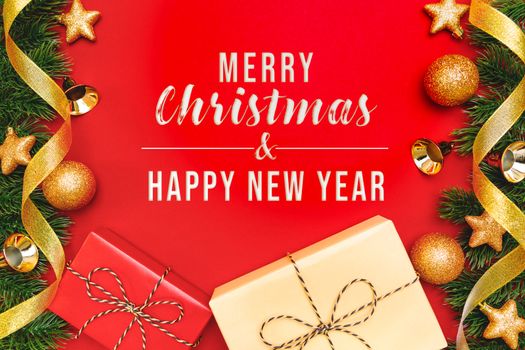 Christmas present and pine tree with xmas decoration on Red background