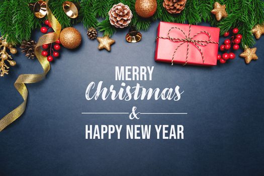 Christmas present and pine tree with xmas decoration on blue background