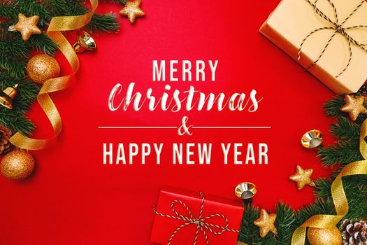 Christmas present and pine tree with xmas decoration on Red background