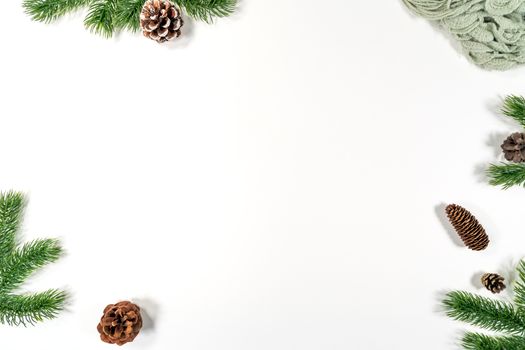 Christmas winter composition. Christmas pine cones, fir branches on white background. Flat lay, top view, copy space