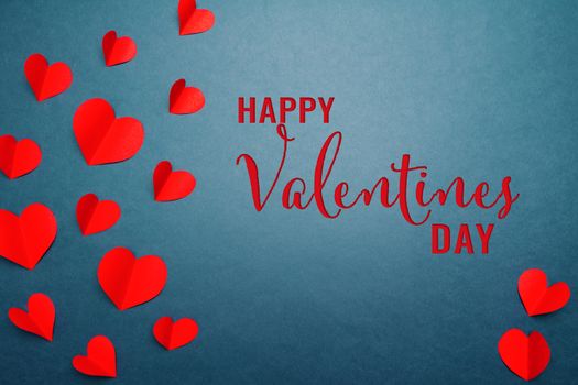 Valentine card with red heart on blue background, abstract, flat lay, top view