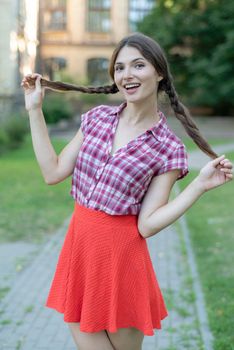 Girl in a red plaid shirt