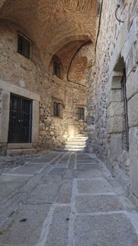 Caceres, Spain, April 2017: narrow streets and alleys of the historical old town of Caceres, Extremadura, Spain.