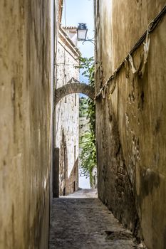 Caceres, Spain, April 2017: narrow streets and alleys of the historical old town of Caceres, Extremadura, Spain.