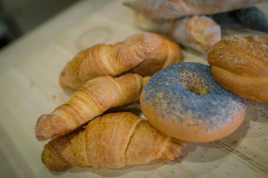 Baked goods are beautifully laid out on a linen towel